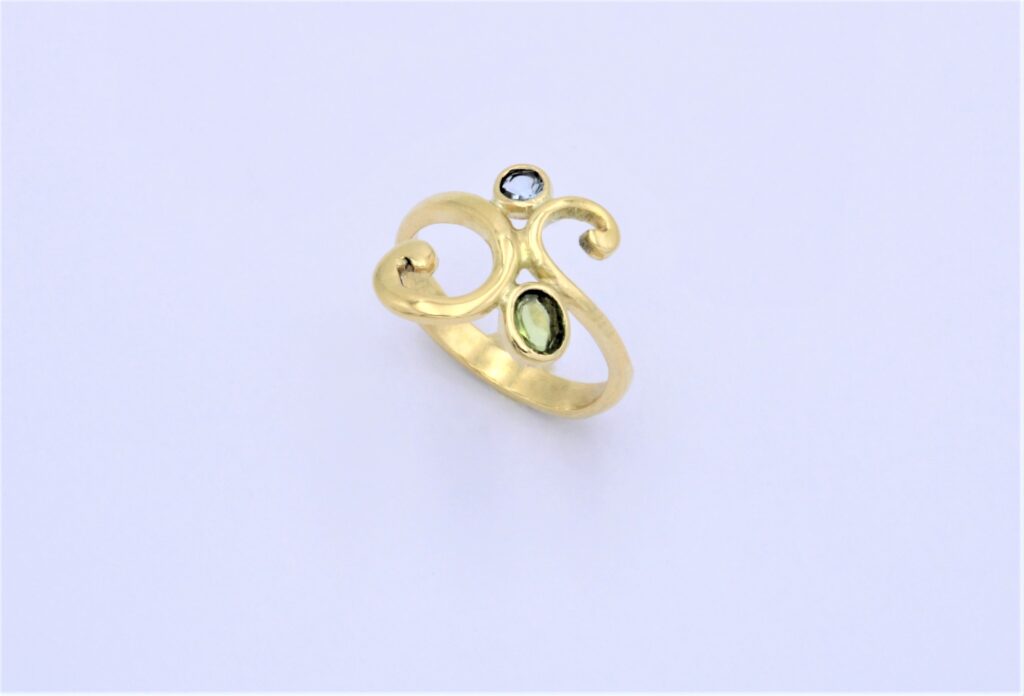 “Wave” Ring, gold, tourmaline and aqua marine