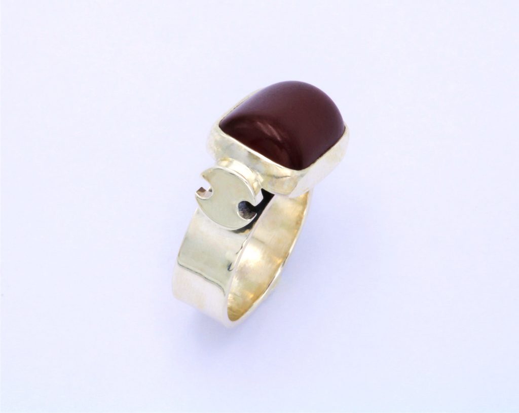 “Two edged axes” Ring, silver , red amber