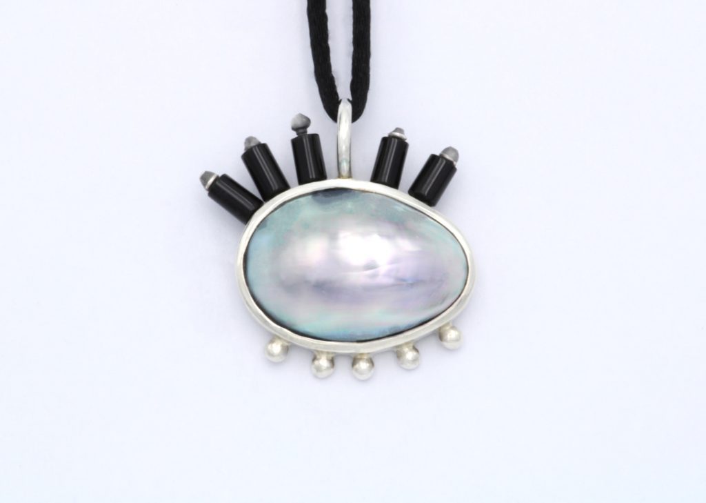 “Picasso eyes” Pendant silver, mother of pearl, onyx